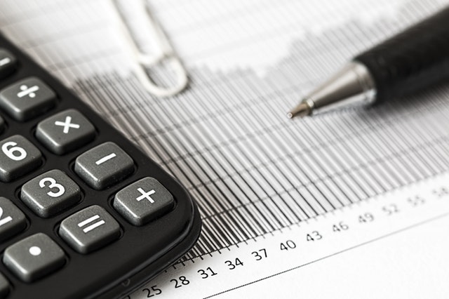 Calculator and financial documents for tax preparation